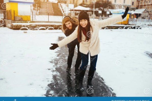 Woman on wedding dress on skates